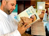  ?? Photo by Neeraj Murali ?? Sheikh Mohammed’s book Reflection­s on Happiness and
Positivity on display during the Emirates Airline Festival of Literature. The English edition of the book is expected to be released next week across the UAE. —