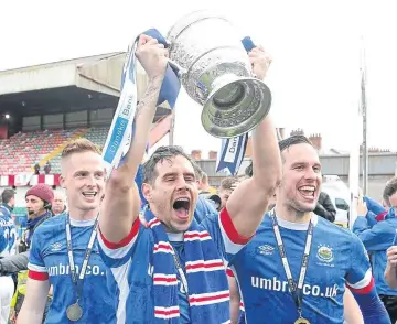  ??  ?? Linfield celebrate last season’s title success and could now face Celtic.