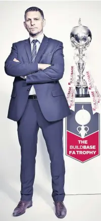  ??  ?? John Askey with the FA Trophy