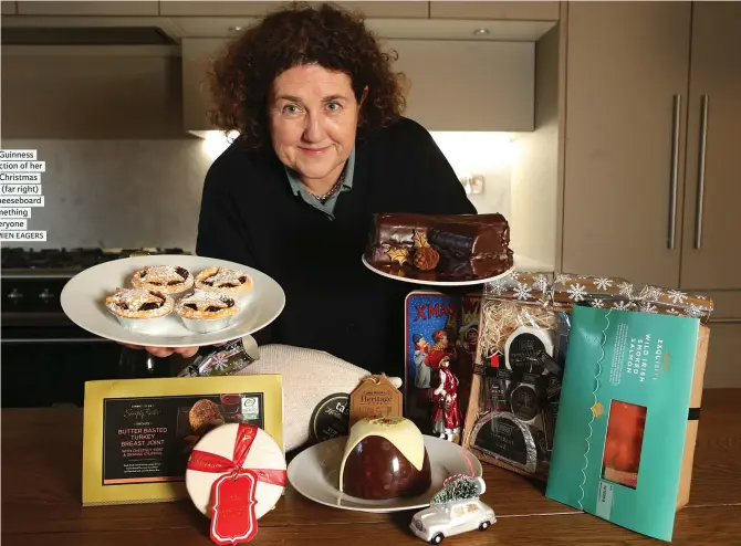  ?? PHOTO: DAMIEN EAGERS ?? Katy McGuinness with a selection of her favourite Christmas foods and (far right) Dunnes’ cheeseboar­d has something for everyone