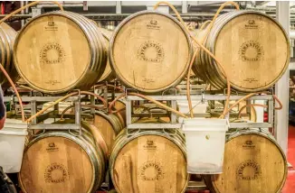  ??  ?? Below » Firestone Walker’s union system is used primarily for fermenting their Double Barrel Ale (DBA).
Opposite » Los Angeles Ale Works’ system for fermenting Berliner weisse ales in wood took inspiratio­n from historical fermentati­on systems...