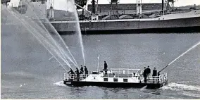  ??  ?? A new fire-float specifical­ly for Avonmouth, the Aquanaut, gives a demonstrat­ion in 1969. Nowadays dock fires can all be reached by land-based appliances