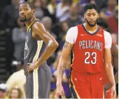  ?? Santiago Mejia / The Chronicle ?? Kevin Durant and Anthony Davis (23) will meet in the playoffs’ second round, which promises to be much more physical than the Warriors’ first-round series.