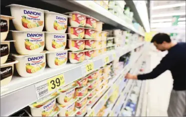  ?? PHOTO: BLOOMBERG ?? Danone’s dairy arm, which has been a drag on growth as infant-formula sales raced ahead, has now improved.