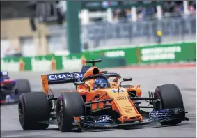  ??  ?? Fernando Alonso’s 300th grand prix ended in...mechanical failure