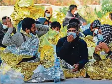  ?? Foto: ČTK ?? Právě dorazili Nově příchozí migranti na ostrově Lampedusa.