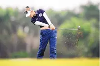  ?? LANDON BOST/NAPLES DAILY NEWS VIA AP ?? Nelly Korda plays the 18th hole on Thursday at Tiburon Golf Club. She shot 6-under-par 66, two strokes off the lead but a good start toward winning the CME Group Tour Championsh­ip.