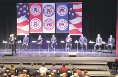  ?? H John Voorhees III / Hearst Connecticu­t Media ?? Danbury Mayor Mark Boughton was the first to speak as nine Republican­s running for governor debated Wednesday at New Britain High School.