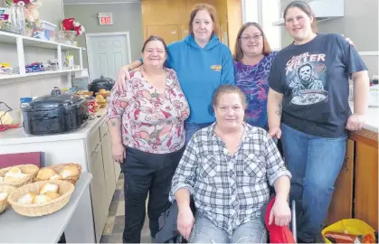  ??  ?? The Honey Bees, front, Colleen Mccann, and back, from left, Michele Whynot, Lisa Harris, volunteer Debbie Harvey and Liz Ringer. SUE DESCHENE