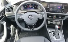  ??  ?? The 2019 Jetta has Volkswagen’s configurab­le Digital Cockpit instrument cluster, and the base car comes with a 16.5-centimetre touch screen.