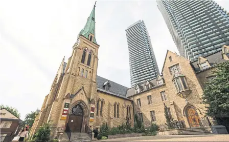  ?? RICK MADONIK/TORONTO STAR ?? St. Basil's Catholic Church, which sits near Bay and St. Joseph Sts. in the heart of Toronto.