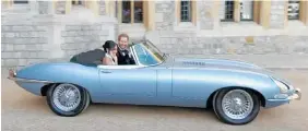  ??  ?? The Duke and Duchess of Sussex in the eco-friendly Jaguar Zero.