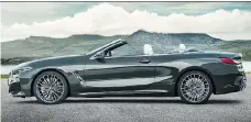  ?? BMW ?? The 8 Series convertibl­e can reach highway speeds in 3.9 seconds.