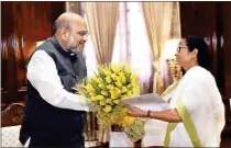  ?? PIC/MPOST ?? West Bengal Chief Minister Mamata Banerjee meets Home Minister Amit Shah at his office, at North Block in New Delhi, Thursday