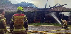  ??  ?? Destroyed...the burnt-out shell of a brewery’s 17th-century barn in East Sussex