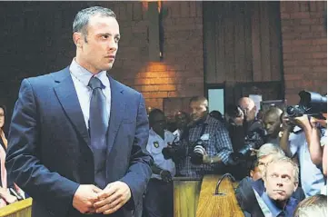  ??  ?? BLADE RUNNER IN COURT: Pistorius appears at the Magistrate Court in Pretoria. — AFP photo