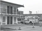  ?? ?? An ambulance delivers a patient to an isolation and quarantine shelter for homeless people in the Northland neighborho­od.