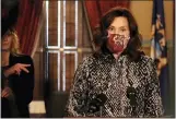  ?? MICHIGAN OFFICE OF THE GOVERNOR VIA AP ?? Gov. Gretchen Whitmer speaks during a news conference in Lansing, Monday, where she said the state’s partial lockdown will continue through Dec. 20.