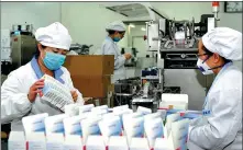  ?? PROVIDED TO CHINA DAILY ?? Jihua 3534 Garment based in Wenxi county, Shanxi province, works at full capacity to produce protective clothing in the fight against the epidemic nationwide.