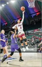  ?? COURTESY OF RIDER ATHLETICS ?? Rider’s Stella Johnson (4) scores a basket against Niagara during a MAAC Tournament quarterfin­al game at Boardwalk Hall in Atlantic City.