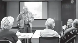  ?? Staff photo by Jennifer Middleton ?? Dr. Mike Buttrem, sedimentat­ion and water quality specialist for the Sulphur River Basin Authority, speaks at Tuesday’s meeting of Friends United for a Safe Environmen­t. Buttrem explained how the straighten­ing of a portion of the Sulphur River...