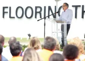  ?? STAFF FILE PHOTO ?? Jeff Lorberbaum, the chairman and chief executive officer of Mohawk Industries, speaks during a June 2019 flag raising event at Mohawk in Calhoun, Georgia.