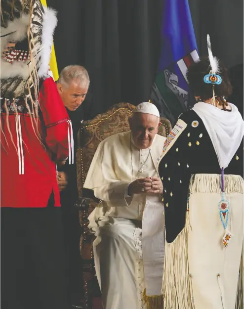  ?? ERIC GAY / THE ASSOCIATED PRESS ?? First Nations leaders welcome Pope Francis in Edmonton on Sunday as he begins his journey of reconcilia­tion.