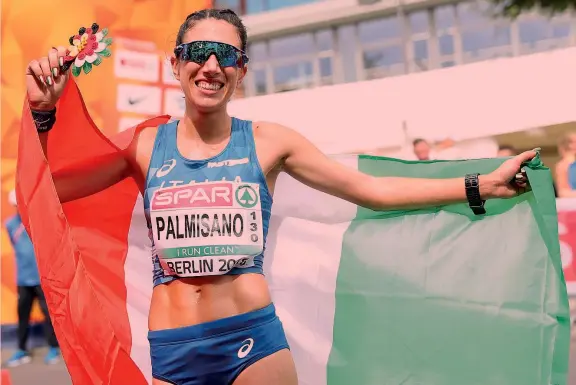  ??  ?? Antonella Palmisano, 27 anni, tarantina di Mottola, atleta delle Fiamme Gialle è stata medaglia di bronzo nei 20 km di marcia anche ai Mondiali di Londra 2017 COLOMBO