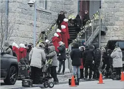  ?? DAVID BEBEE WATERLOO REGION RECORD ?? A film crew gets ready to shoot a scene for the Hulu television series “The Handmaid's Tale” outside Cambridge City Hall on Tuesday.