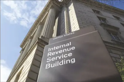  ?? SUSAN WALSH/AP ?? THE EXTERIOR OF THE INTERNAL REVENUE SERVICE (IRS) BUILDING is seen in Washington, on March 22, 2013.