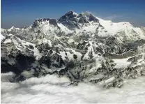  ?? PHOTO: REUTERS ?? Mt Everest, the region in which an avalanche buried a Japanese trekking group in 1995, killing 26.