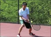  ?? AUSTIN HERTZOG - DIGITAL FIRST MEDIA ?? Methacton’s Alan Shen hits a backhand against Owen J. Roberts’ Brandon Miller at No. 2 singles Wednesday.