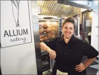  ?? Brian A. Pounds / Hearst Connecticu­t Media ?? Newtown native Michelle Greenfield recently opened her Allium Eatery restaurant at 54 Railroad Place across from the Westport train station.