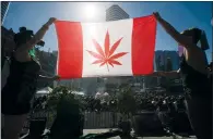  ?? CP PHOTO MARK BLINCH ?? Opposition parties and legal experts are urging the Liberal government to be clear on how it plans to handle the legalizati­on of cannabis while Canada remains party to three UN treaties that control and criminaliz­e drug access.