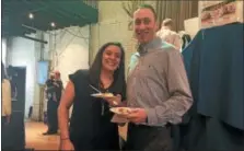  ?? NICHOLAS BUONANNO — NBUONANNO@TROYRECORD.COM ?? Andrew and Nicole O’Keefe enjoy some food during the event.