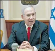  ?? Sebastian Scheiner AFP/Getty Images ?? BENJAMIN Netanyahu got three parties to form an alliance by promising them government seats.