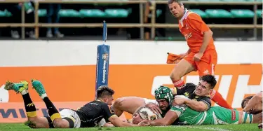  ?? PHOTO: WARWICK SMITH/STUFF ?? Manawatu Turbos lock Jackson Hemopo crosses for one of his side’s first-half tries.