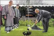  ?? PTI ?? President Ram Nath Kovind plants a sapling of Mahabodhi tree during a visit to the Tsukiji Hongwanji Buddhist Temple in Tokyo, Japan, Monday