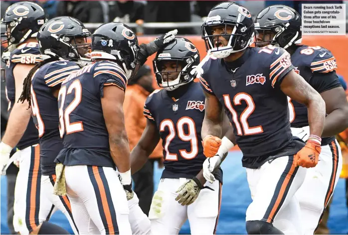  ?? DAVI DBA NKS/GETT Y IM AGES ?? Bears runnin gb ack Tarik Cohen get sc ongratulat­ions after one of his three touchdown reception sl ast season.