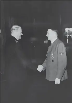  ?? / Foto: Getty Images ?? 14. februar 1942, Vidkun Quisling in Adolf Hitler
