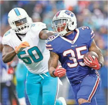  ?? TIMOTHY T. LUDWIG, USA TODAY SPORTS ?? Mike Gillislee, who averaged 5.7 yards per carry and had eight rushing touchdowns for the Bills last season, should add a boost to the Patriots’ running game.