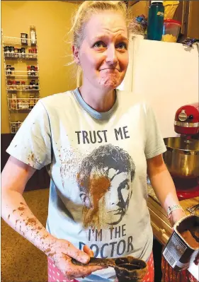  ?? (Courtesy Photo) ?? Sometimes things go wrong in the kitchen — and that’s half the fun for Sarah Mouritsen, who is making a YouTube cooking show with her boyfriend, Charlie Riedmuelle­r.