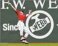  ?? Mary Schwalm / Associated Press ?? Boston Red Sox second baseman Trevor Story is unable catch a hit by Oakland Athletics batter Cristian Pache during the third inning Thursday in Boston.