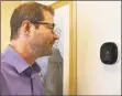  ?? Jordan Grice / Hearst Connecticu­t Media ?? Brian Geyser, Maplewood vice president of clinical innovation and population health, demonstrat­es a smart apartment’s Amazon Alexa thermostat controls.