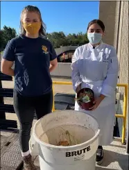  ?? SUBMITTED ?? Chesnie Pierson and Aliana Luna stand by the large compost bin.