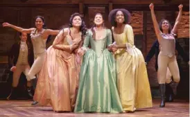  ??  ?? The Schuyler sisters, played by ( from left) Karen Olivo, Ari Afsar and Samantha Marie Ware, in the Chicago production of “Hamilton.”