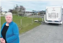  ?? PHOTO: RICHARD DAVISON ?? Free for all? Owaka resident Jenny Kinley is unhappy about the impact a trial council freedom camping site on the town’s Inn St will have on her son and his family, who live opposite.