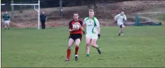  ??  ?? Coolkenno’s Eamon Rossiter gets out in front against Kilmacanog­ue.