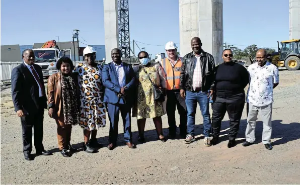  ?? Picture: TK MTIKI ?? CRUCIAL INFRASTRUC­TURE: Ndlambe municipal manager, advocate Rolly Dumezweni, Ndlambe director of infrastruc­ture, Dr Noluthando Vithi, CFO in the Office of the Premier (former programme manager for the Small Towns Revitalisa­tion Project) Liziwe Ndzima, MPLs Makhaya Twabu and Zinziswa Rabe, engineerin­g consultant Aubrey Gelderblom, MPL Nqaba Bhanga, OTP general manager Busisiwe Khumalo, and monitoring and evaluation manager, Dumisani Feni, during an oversight visit to the 2.6 megalitre elevated tower on Monday, in Thornhill, in Port Allfred. The tower is close to being completed, with 3% of the work left to be done