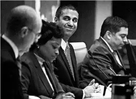  ?? ALEX WONG/GETTY ?? FCC Chairman Ajit Pai, an opponent of the Obama-era net neutrality rules, expresses his delight with Thursday’s meeting in Washington. The GOP-controlled committee voted 3-2.